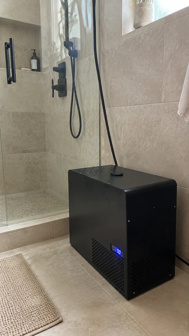 Olsek cooling unit installed beside Khalid M.'s walk-in shower